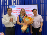 Ceremony of awarding a certificate of appreciation for Can Tho University development to Professor Marie-Louise Scippo, the University of Liege, Belgium